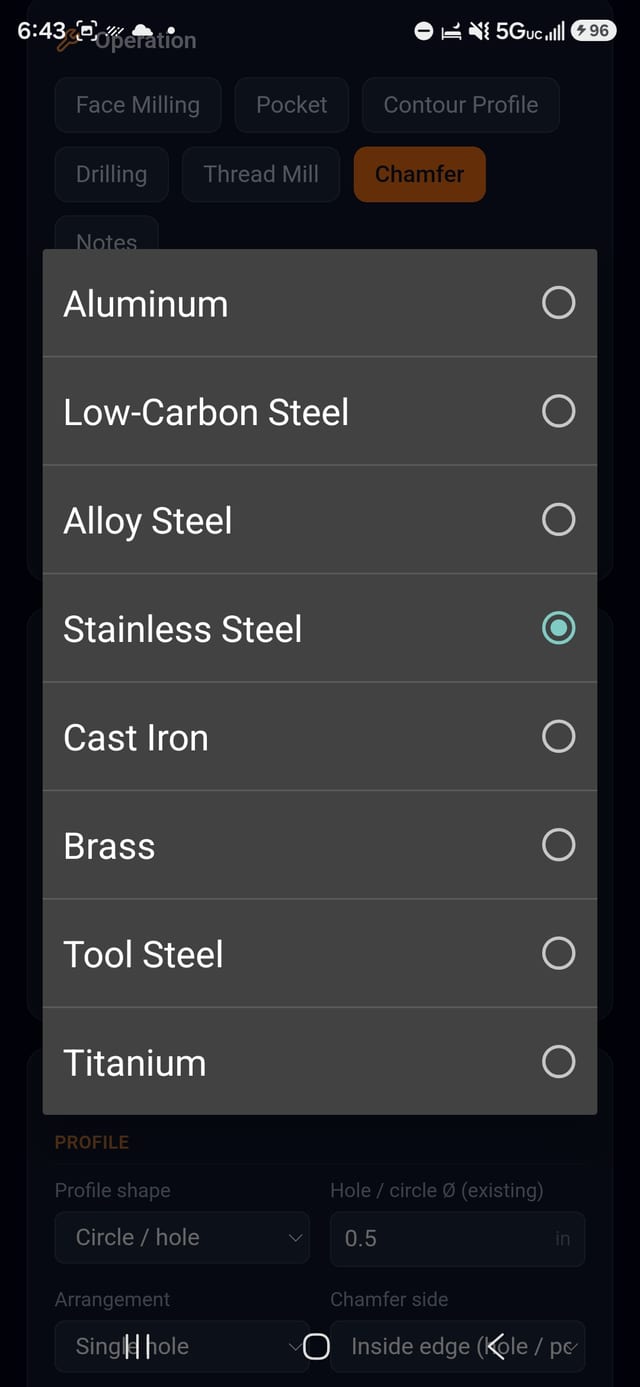 Material picker open on the mill screen, listing aluminium through titanium.